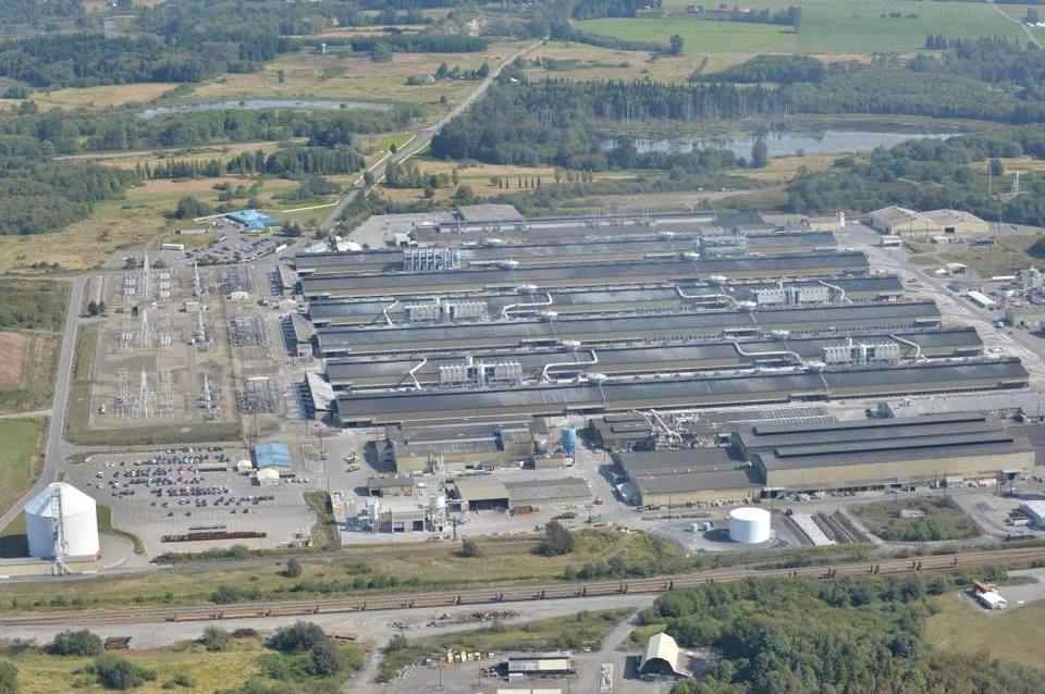 The Alcoa Intalco aluminum smelter, as seen from the air Sept. 19, 2013, will remain open at least two more years after a power deal was announced Tuesday, April 12, 2016. The Ferndale smelter had been scheduled to have its operations curtailed in June, laying off 465 workers. (Bellingham Herald photo)