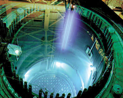 After six years of service in Columbia Generating Station's reactor, nuclear fuel rods are moved to a holding pool prior to be loaded into steel and concrete storage casks. The fuel still retains 95 percent or more of its energy after six years.