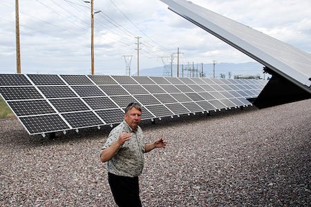 Ross Holter, director of energy and member services with Flathead Electric Cooperative, explains the Solar Utility Network on Aug. 23, 2016. Greg Lindstrom | Flathead Beacon