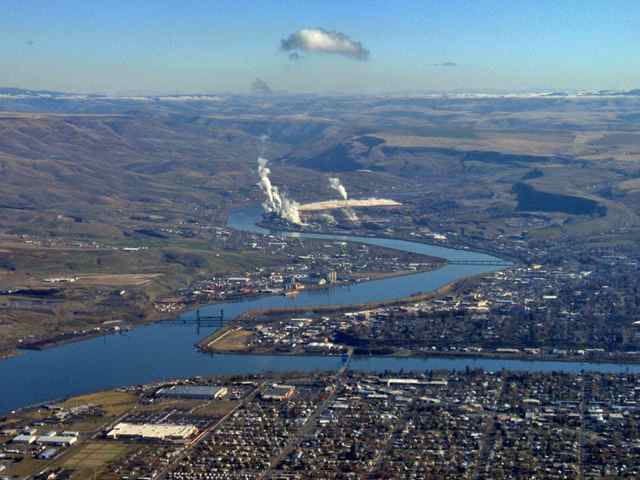 Lewiston's port hugs the left bank of this aerial view of the confluence of the Snake and Clearwater Rivers. Clarkston is at lower right.