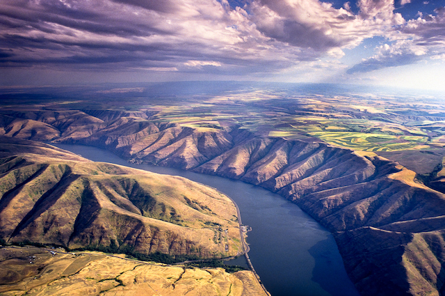 Aerial view of Lower Snake River and some wheat fields high above on fertile soils.