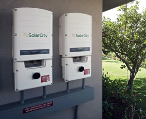Smarter Solar: Inverters convert the direct current from PV panels to the alternating current used by the power grid. Traditional inverters are designed to shut down when they detect a fault, but newer inverters, like these, can be remotely updated to ride through such disturbances.