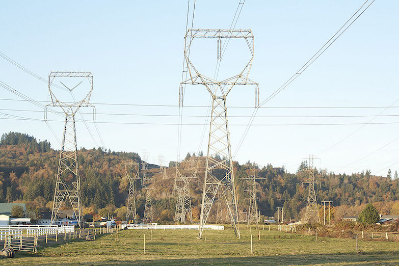 Transmission towers carry electricity through southwest Washington. The state expects to import large amounts of electricity from Montana and Wyoming in the future.