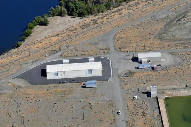 A pump and treat facility near the horn of the Columbia River where it cuts through Hanford is removing hexavalent chromium from groundwater before it reaches the river. (Courtesy DOE)