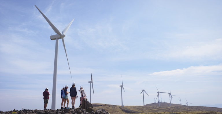 Students toured wind turbines to learn about the complexity of integrating variable power sources into the existing grid. (Image credit: Aaron Kehoe)