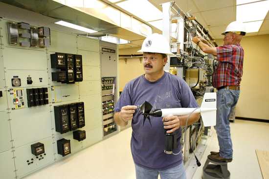 (Kai-Huei Yau) John Lodahl, electronic instrumentation technician for the Bonneville Power Administration, talks about the anemometer to be installed at the Horse Heaven substation off Highway 14. The device will allow for more accurate forcasts of oncoming wind, which will help BPA better prepare for fluctuations in wind energy generation.