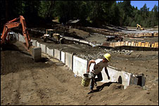 (Meryl Schenke) Workers regrade the stream bed and build concrete weirs to restore Goldsborough Creek in Shelton and, it is hoped, bring back salmon runs.