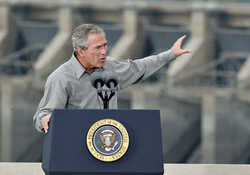 (Paul Erickson) Former President George W. Bush assures a crowd above Ice Harbor Dam in 2003 that the dams on the Snake River were not in jeopardy of being breached while he was in office. During the decade, Bush and most Republicans were embraced by a strong majority of Mid-Columbia voters.