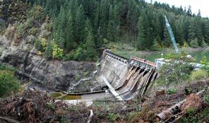 The Condit Dam, in a narrow, twisting canyon near the confluence of the White Salmon and Columbia rivers, began to take shape in 1911.