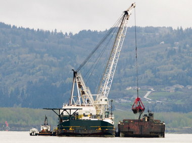 (Brent Wojahn) Back in March, a dredge near Longview, Wash., finished up some of the final work on the 20-year Columbia River dredging project. Officials from Oregon and Washington celebrated the completion of the project Thursday in Vancouver, Wash.
