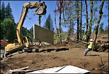 (Meryl Schenker) Concrete weirs are put into place to give returning salmon a breather on their way up Goldsborough Creek where a dam used to be.