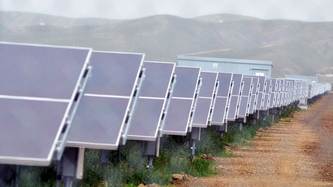 In this Aug. 3, 2011 file photo, solar panels are seen at a solar farm in Avenal, Calif. (AP Photo)