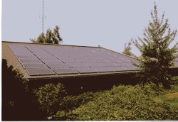 These grid-connected solar panels are on the city of Ashland (OR) Civic Center, part of a 30-kilowatt-capacity solar electric system at four local sites--one of the biggest of its kind in the Northwest. (Photo by Mark Ohrenschall)