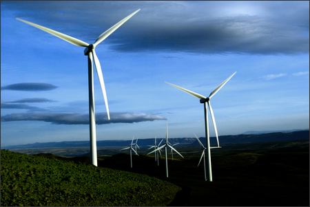 Wind turbines line a Whiskey Dick Mountain ridgeline high above the Columbia River just east of Kittitas. The final six turbines for the Puget Sound Energy Wild Horse Wind Project are nearing completion, with 127 turbines to be online by the end of the year.